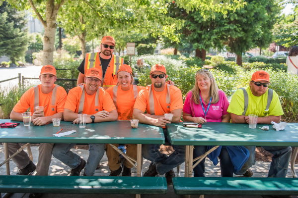 group photo of ops employees at BBQ