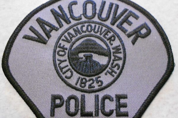 gray police badge