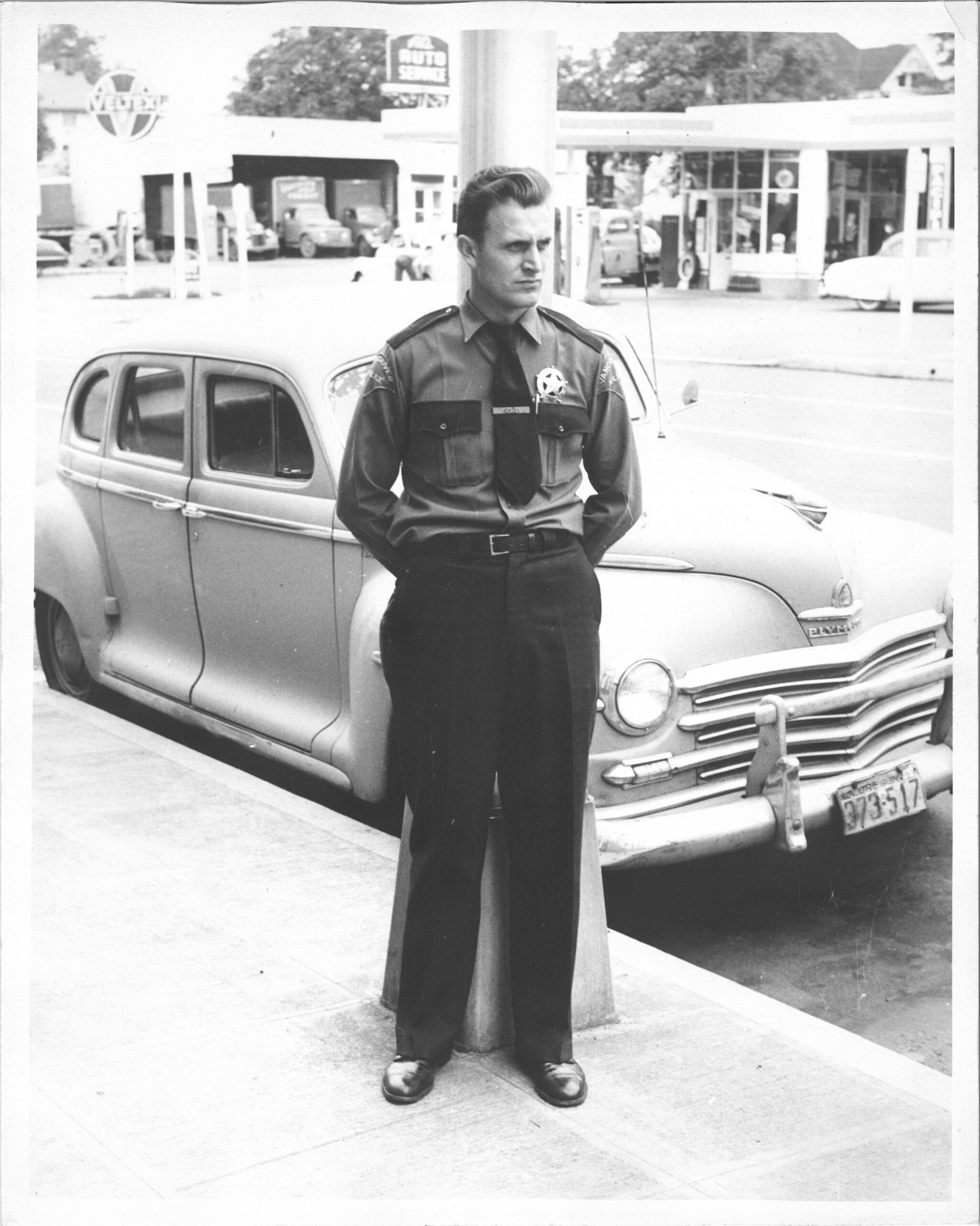 old black and white image of officer