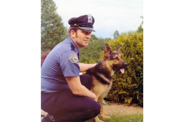 old image of k-9 with officer