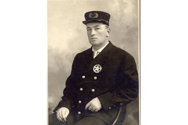 old black and white image of police officer