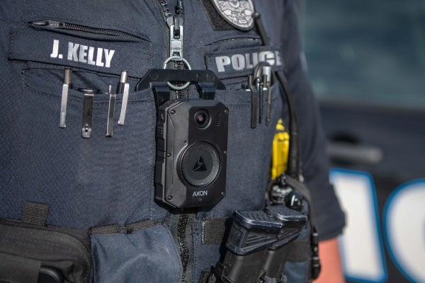 close up of police officer vest of J. Kelly