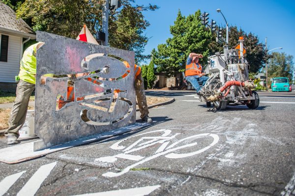 hired crew printing bike on lane