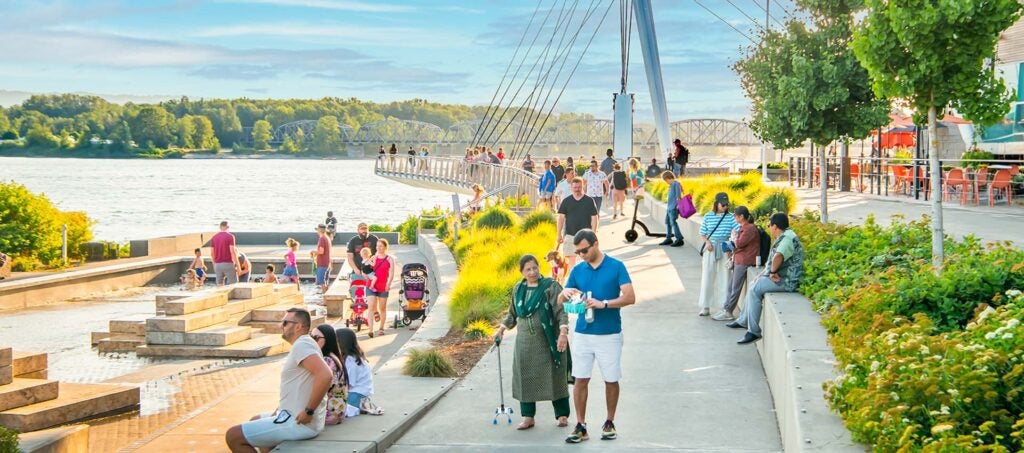 Busy waterfront with families of all ages