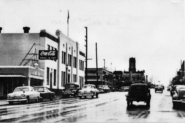 1950s black and white downtown image