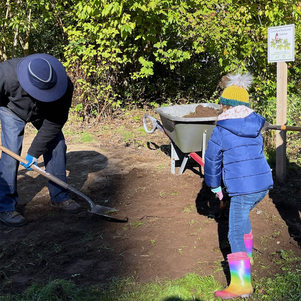 Volunteers cleaning up the garden