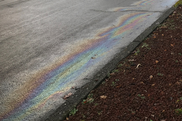 oil spilled along street