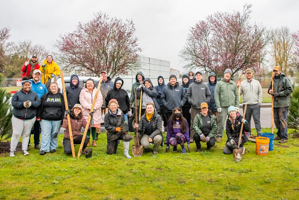 Volunteers at the Arbor Day event, where Mac Awards are annually awarded.