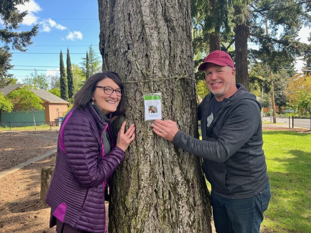 Tree Stewards Dan and Susan with the Carter Park Tree Walk tags