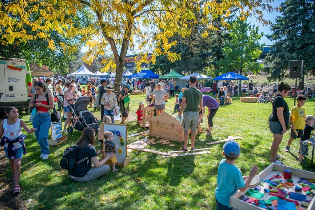 Community members celebrate at the Old Apple Tree Festival