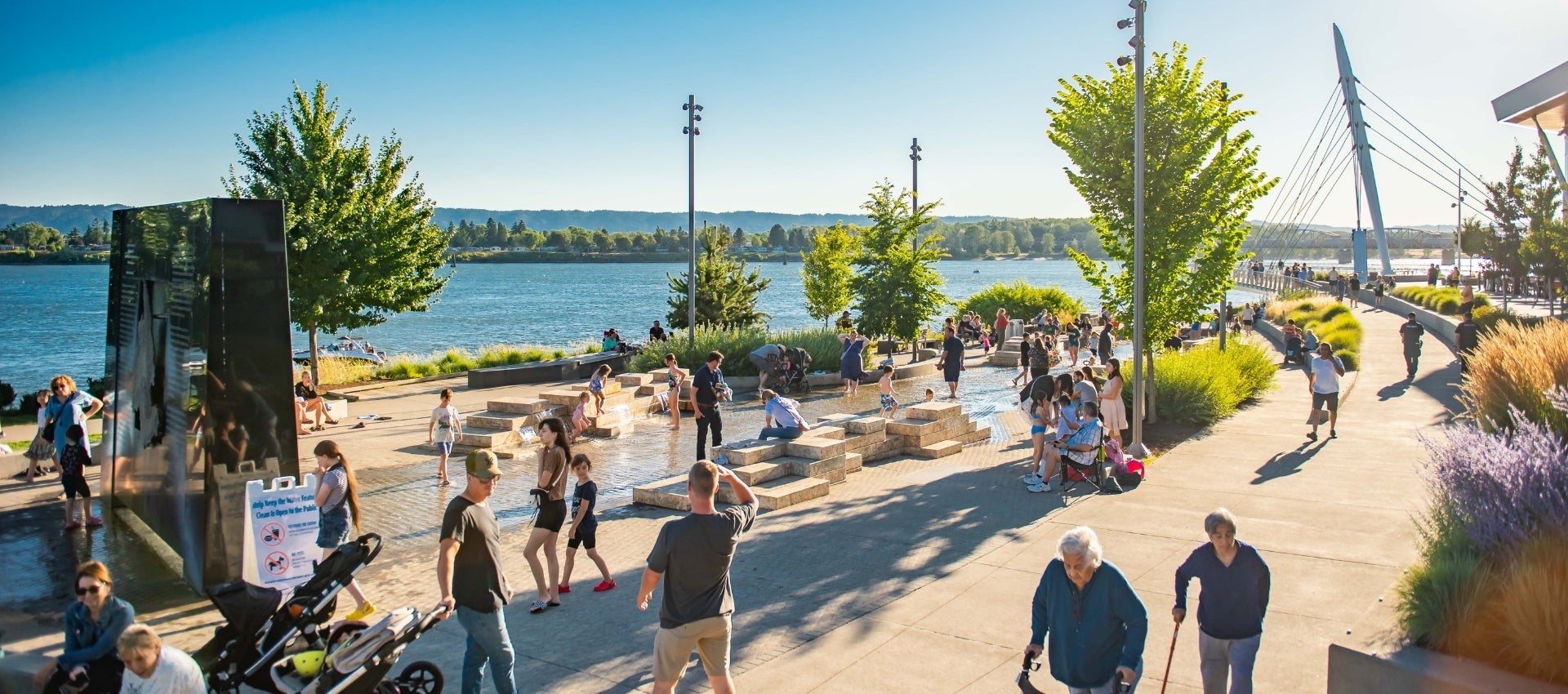 sunny day with a crowd at the Vancouver Waterfront Park