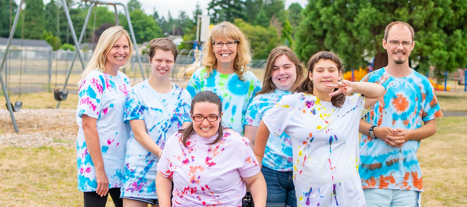 Diverse group image with everyone wearing tie dye t shirts