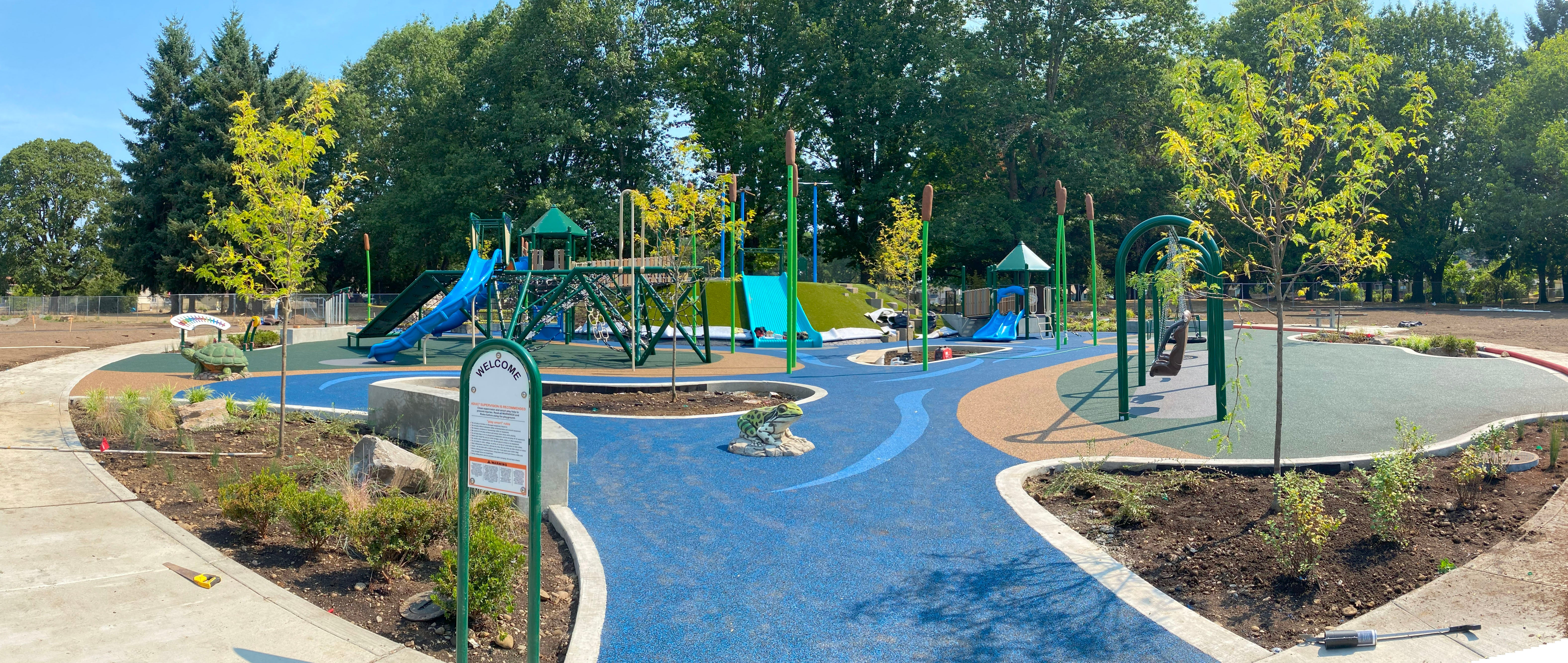 The wetlands-themed playground equipment being constructed at Oakbrook Park.