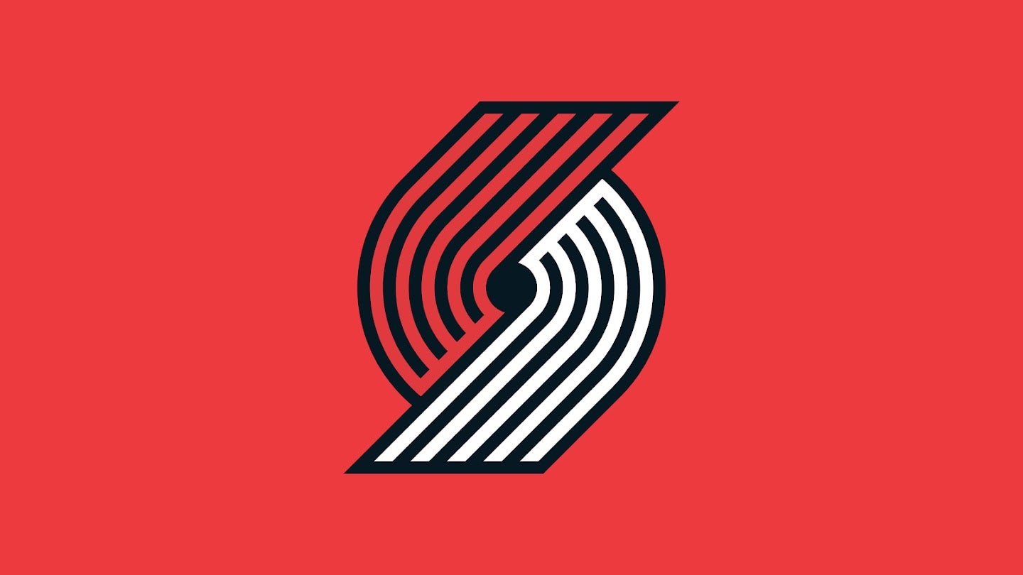 Red, white and black Portland Trail Blazers logo on a red background