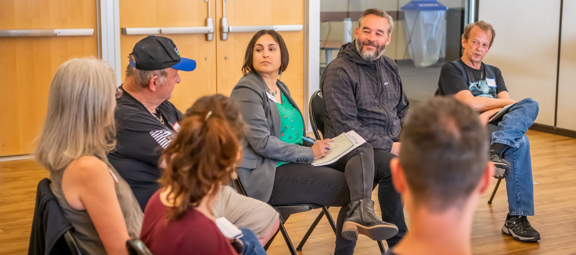 Community members and City Council discuss topics