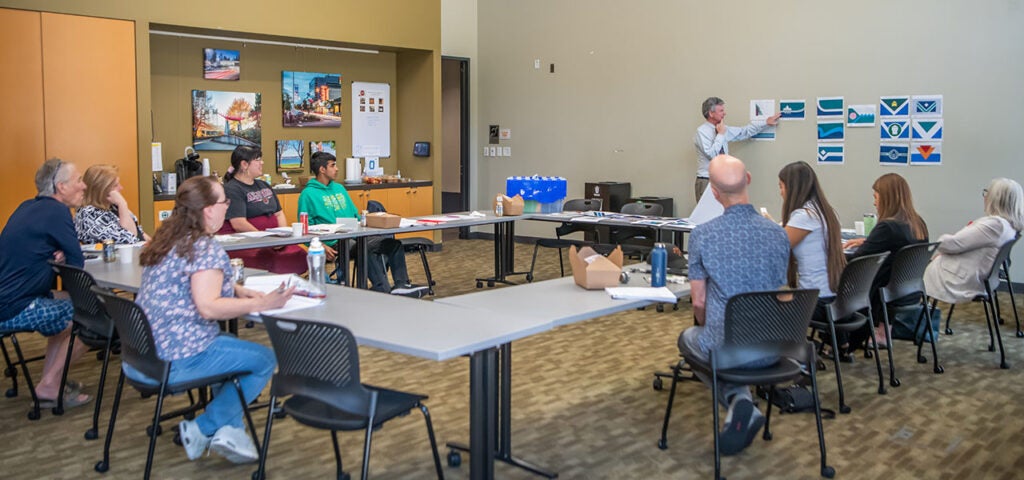 Flag review committee discussing submissions