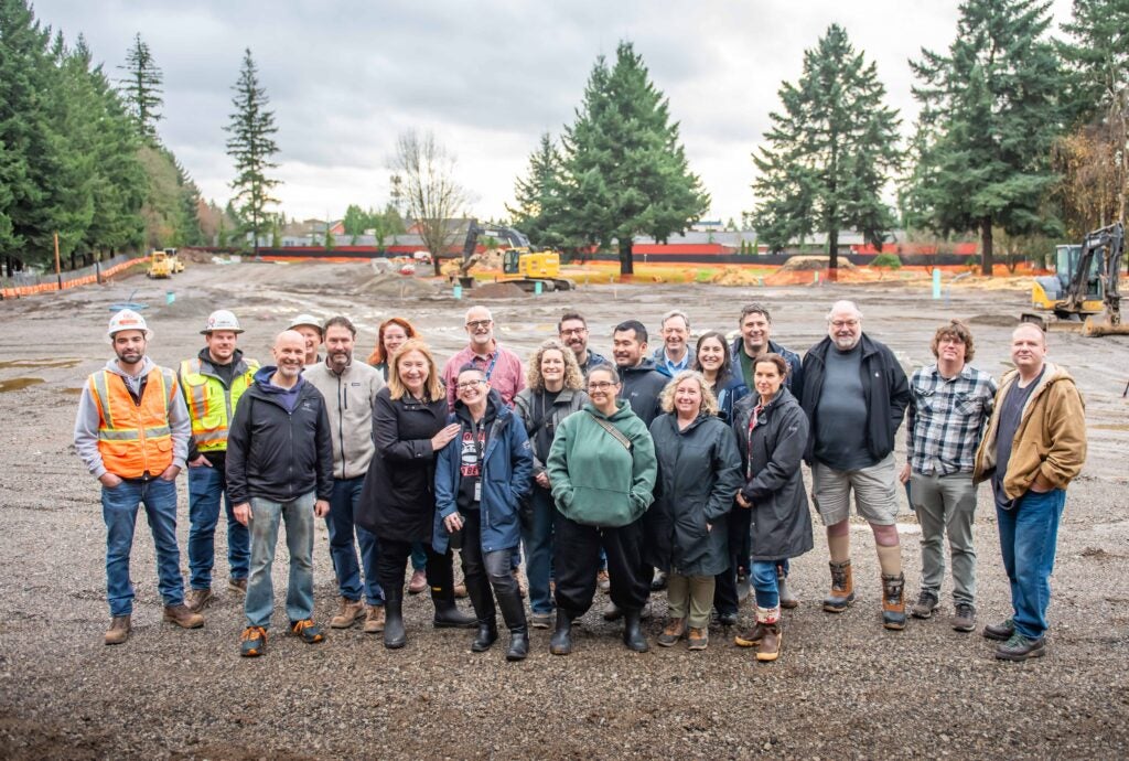 Muddy Boots tour group, including City staff, project partners, policymakers and donors.