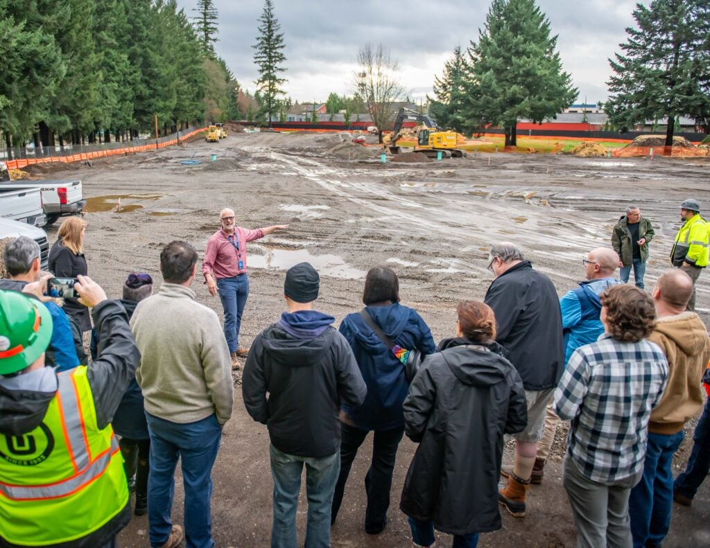 Kevin Kearns, capital projects project manager, provides tour of the future bridge shelter construction site