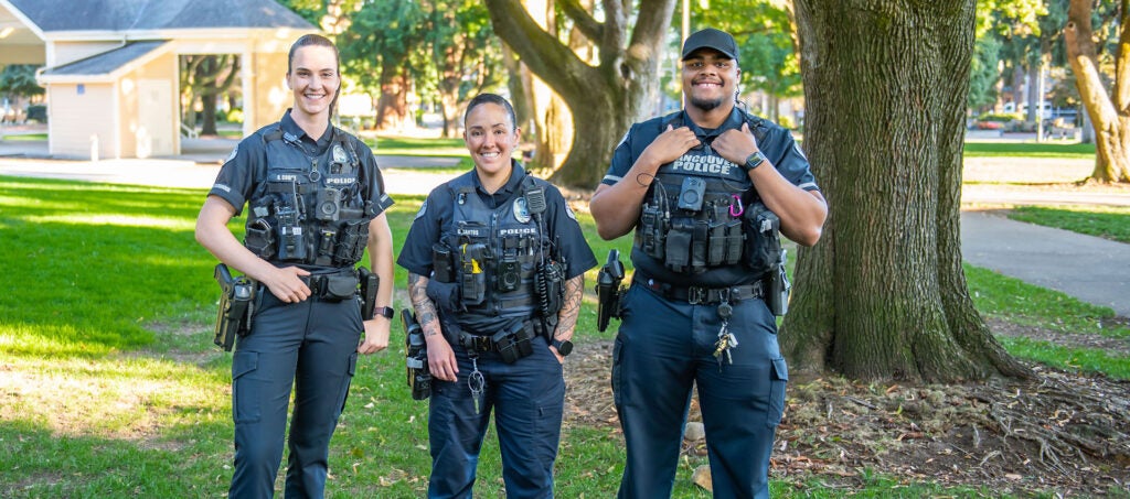Vancouver Police Officers pose for a photo in Esther Short Park