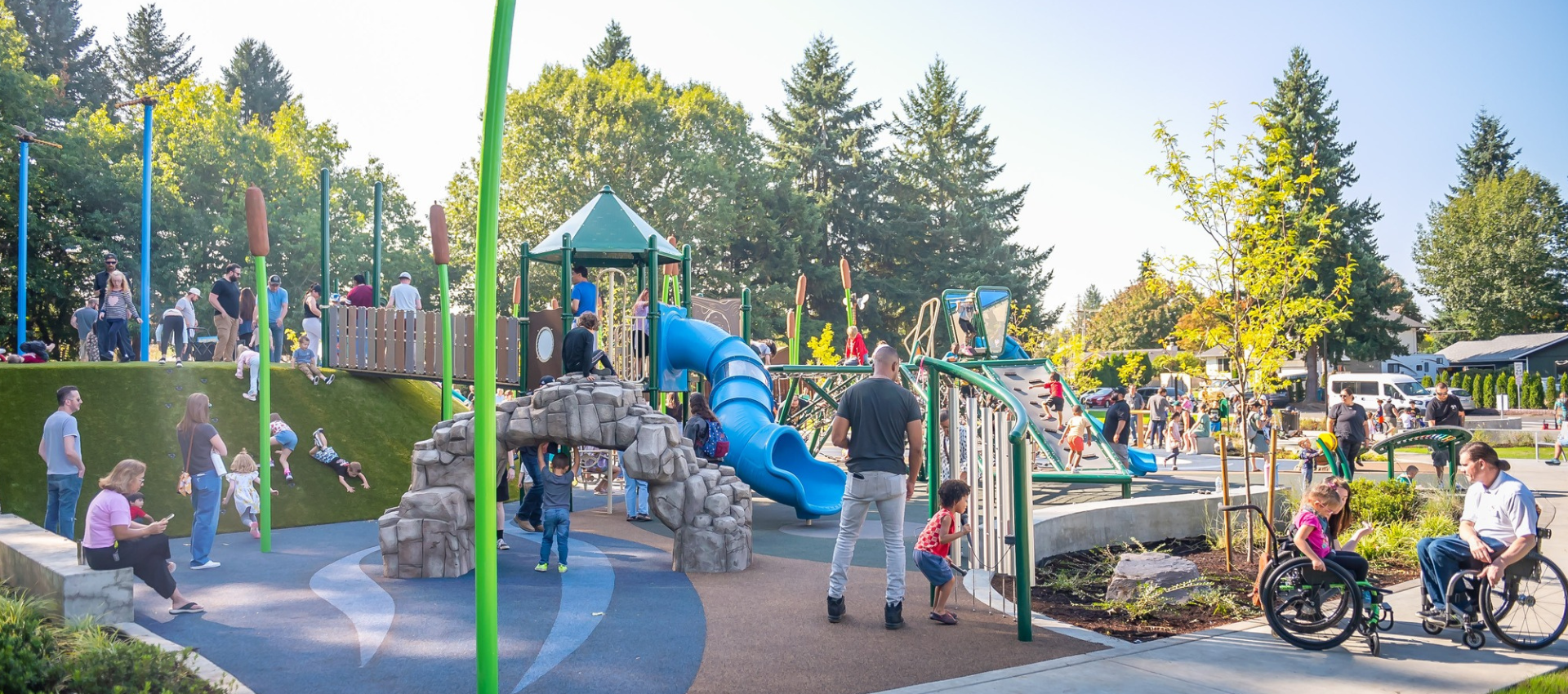 Oakbrook Community Park bustling with people of all ages and abilities.