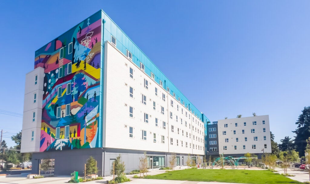 Building with colorful mural on the front.