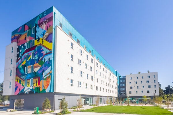 Exterior view of the fourth plain commons building on a sunny afternoon