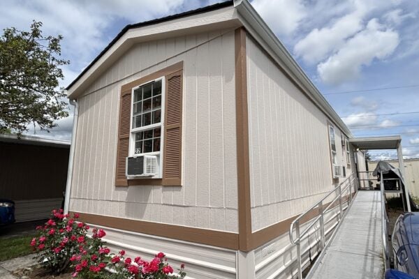 A mobile home with a newly constructed accessible ramp