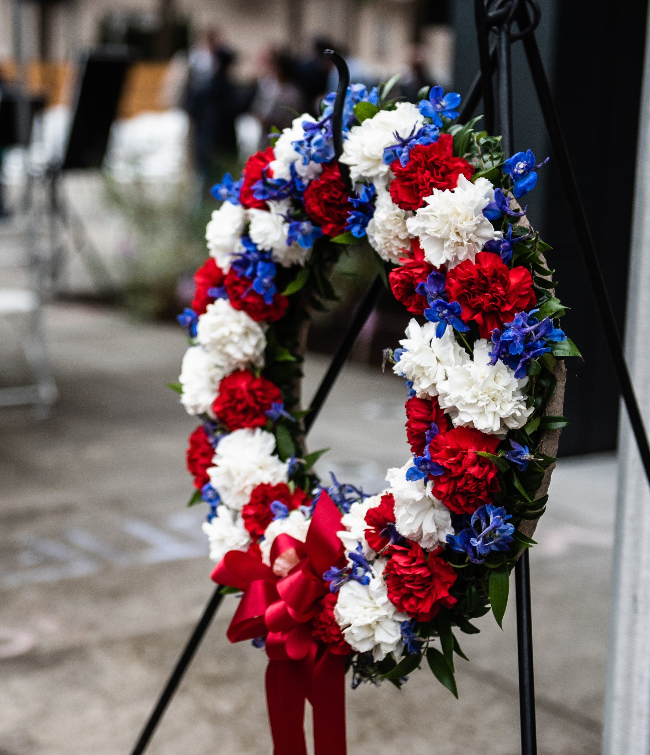 Wreath of red, white and blue flowers