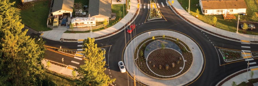 Aerial view of a modern roundabout in a residential neighborhood